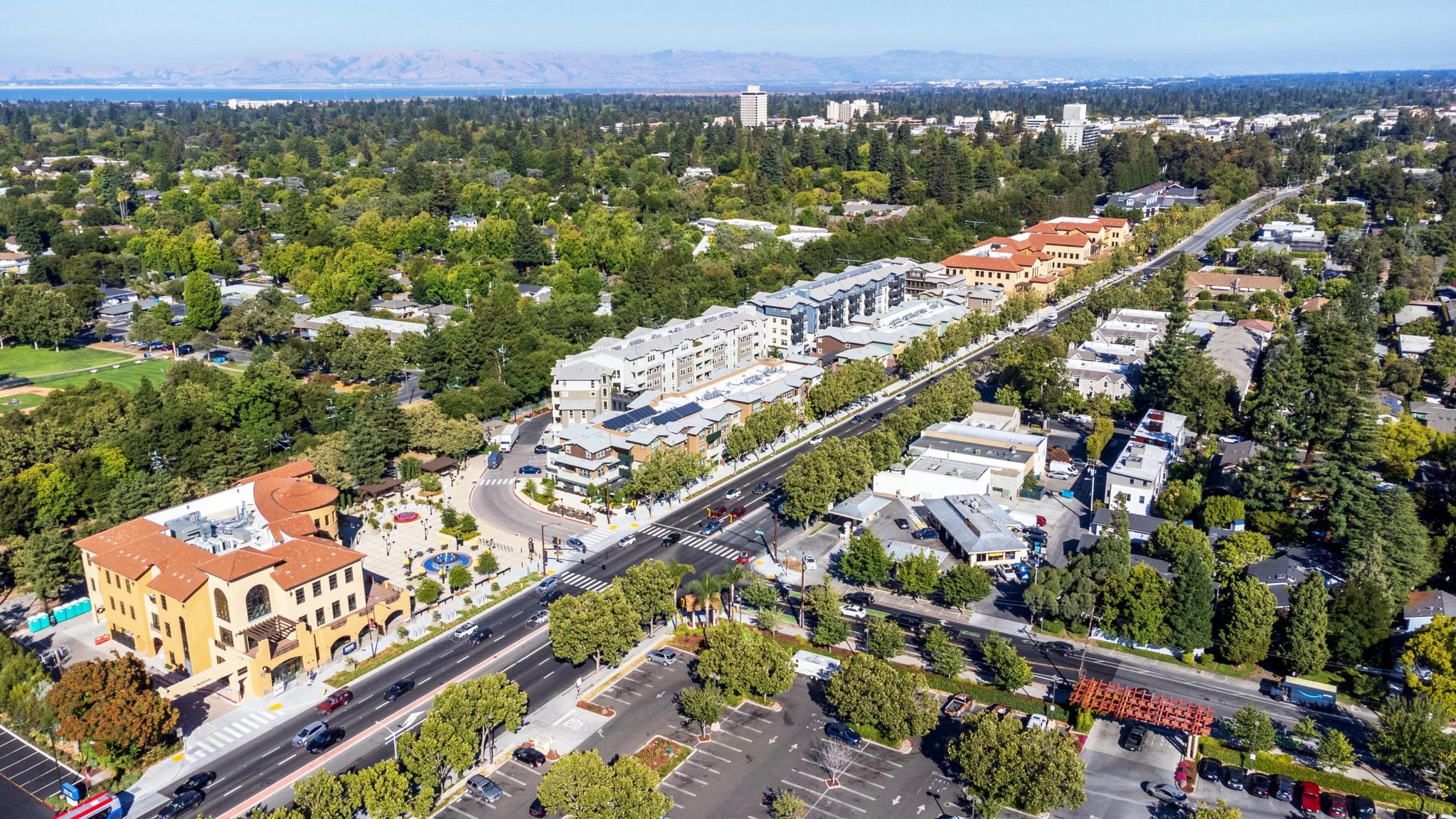 Aerial view of commercial and residential areas of Menlo Park, California toward Palo Alto along El Camino Real Rod near Middle Avenue